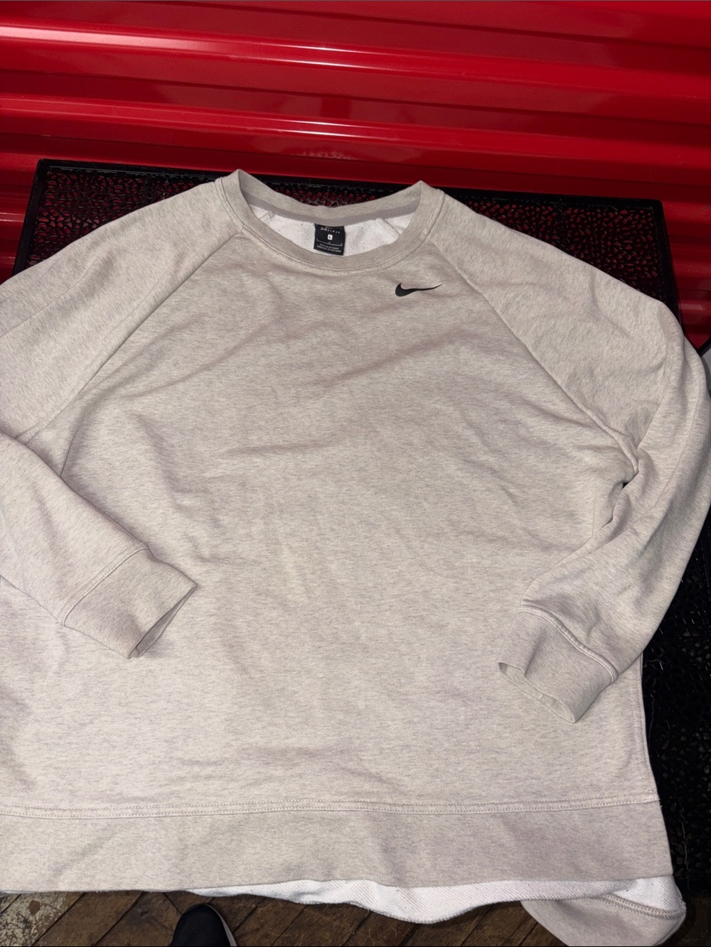 Nike long sleeve running crewneck with 9 inches side pocket on sleeve large